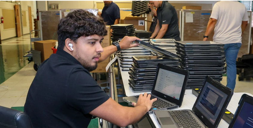 district IT preparing new Chromebooks